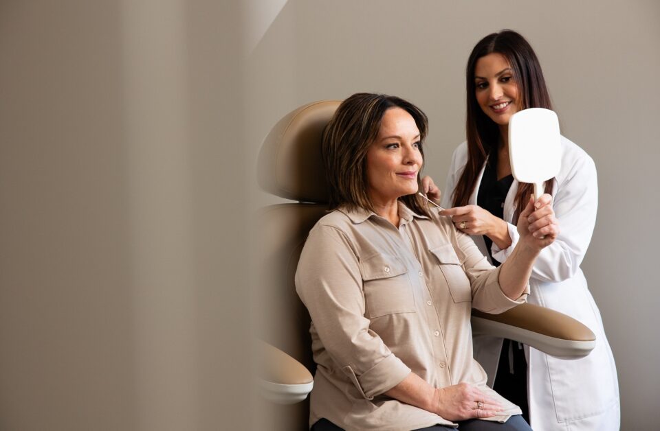 Woman receiving consultation from an Elase provider