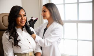 An Elase provider administering a Botox treatment into a client's skin.